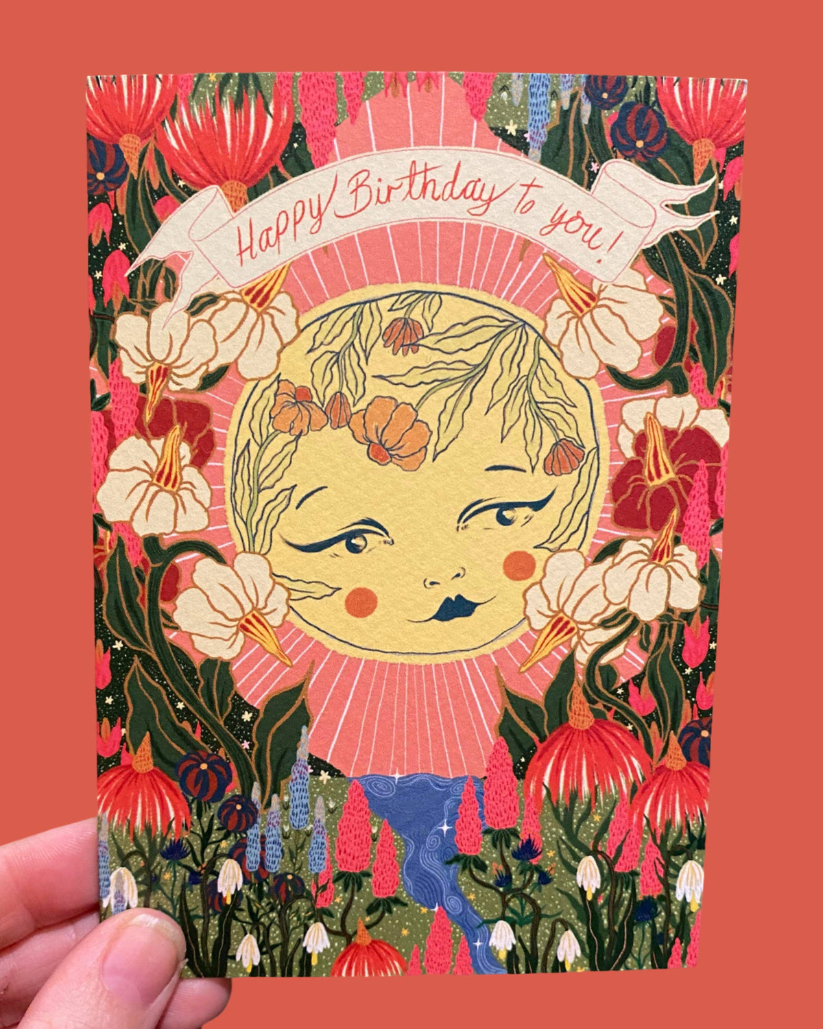 Greeting card with floral design and 'Happy Birthday to you!' text on a red background