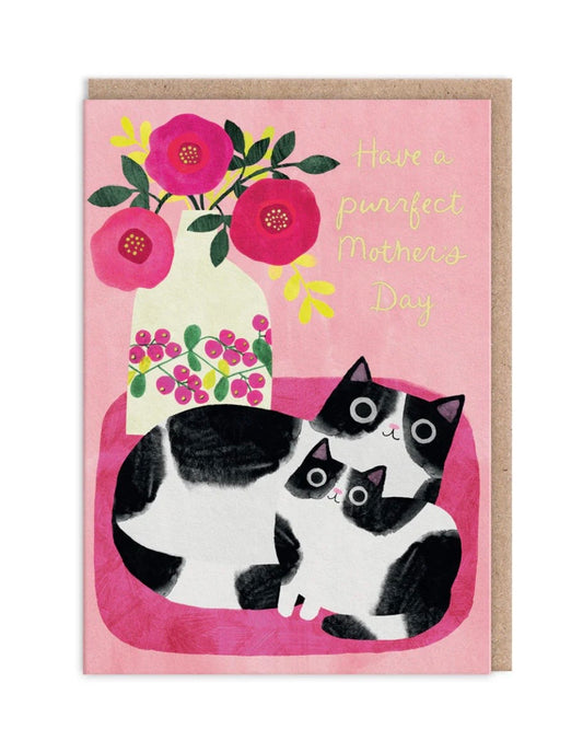 Greeting card with two black and white cats and flowers on a pink background