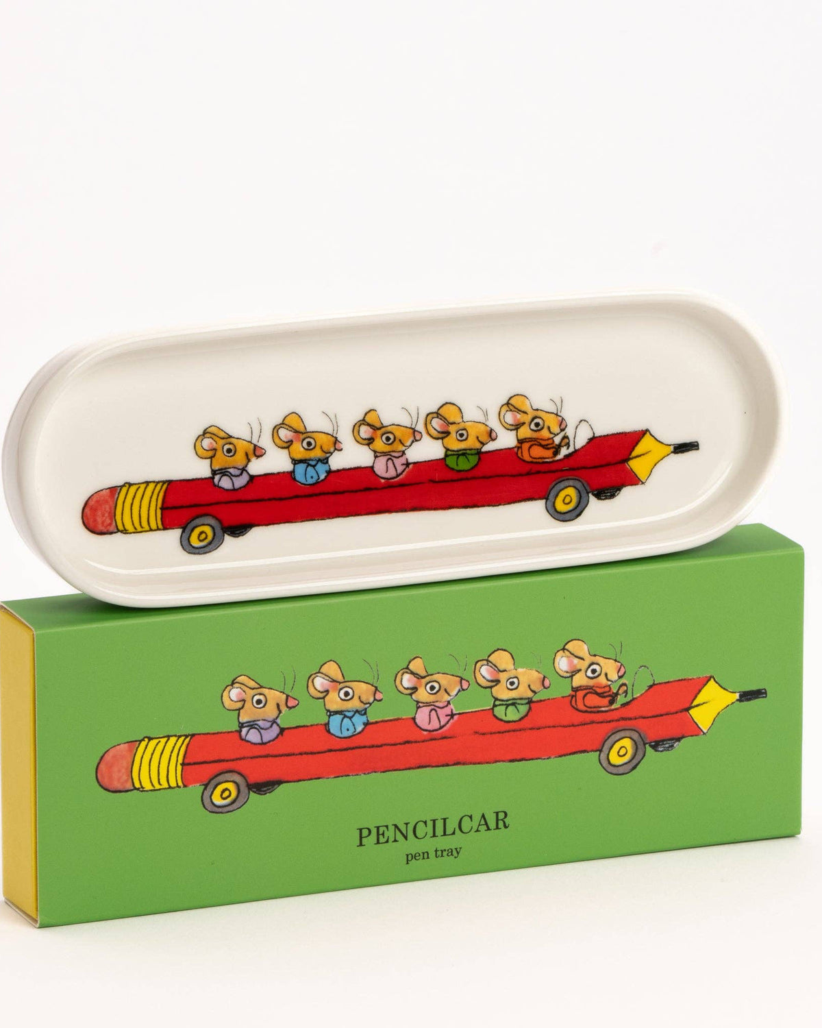 Oval-shaped ceramic pen tray with cartoon design of animals in a red pencilcar, matching box below.